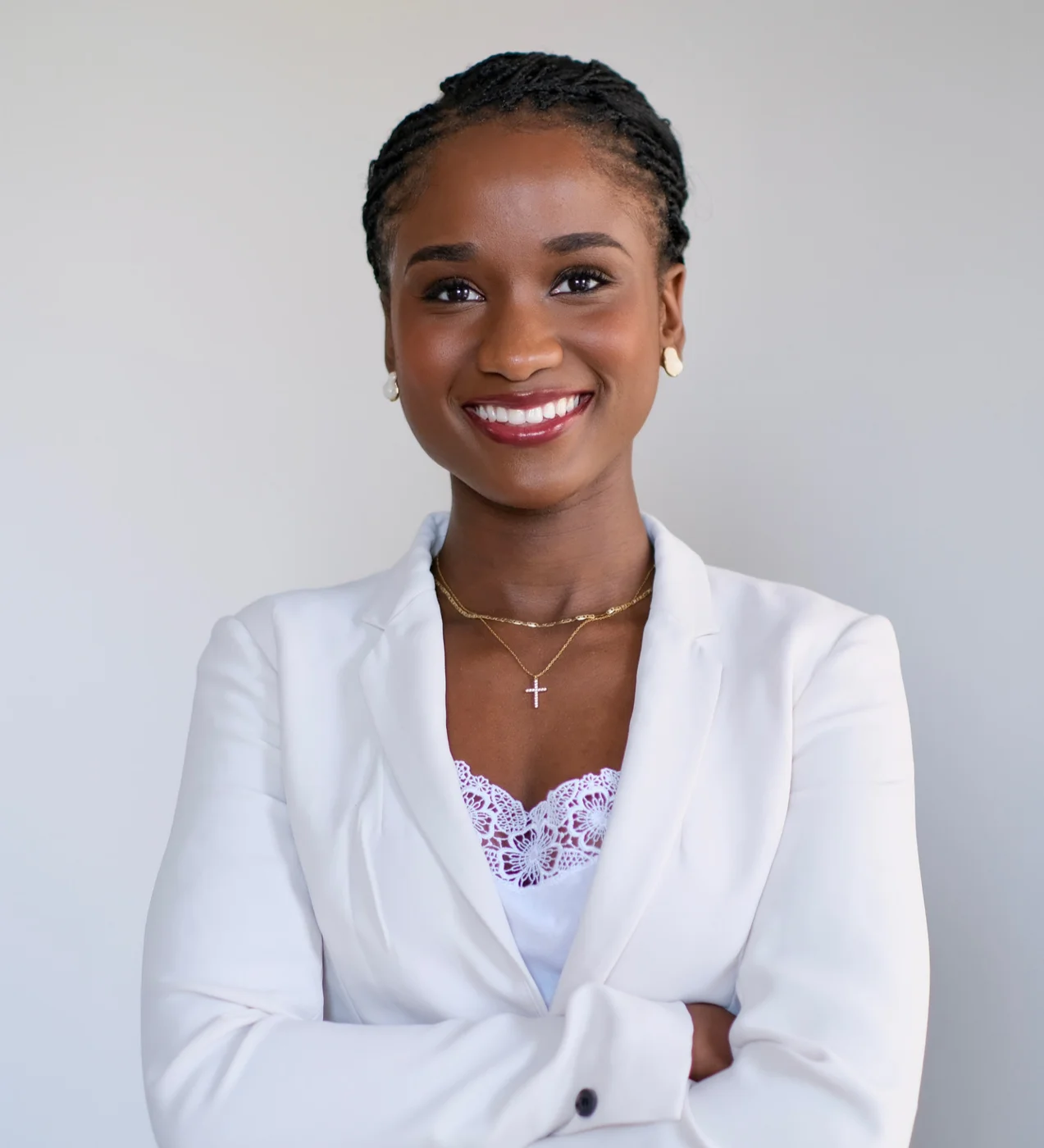 Elizabeth Zion wearing a white blazer